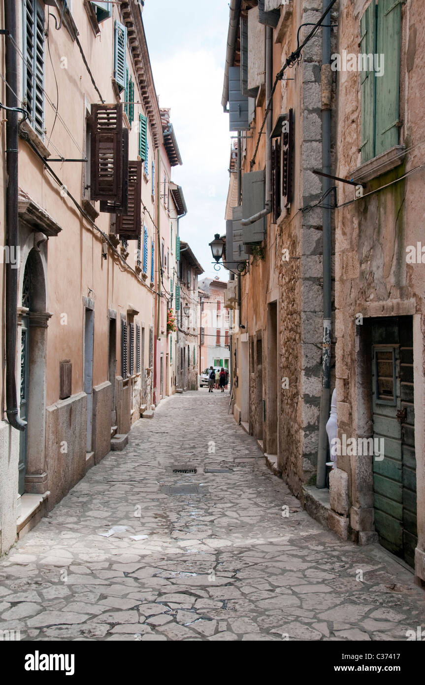 A nice view to a tight alley in the olt town of Rovinj. Stock Photo