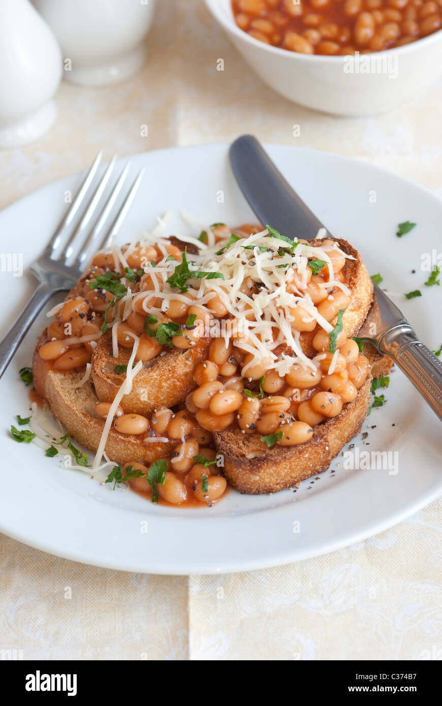 Toast with beans and grated cheese Stock Photo Alamy