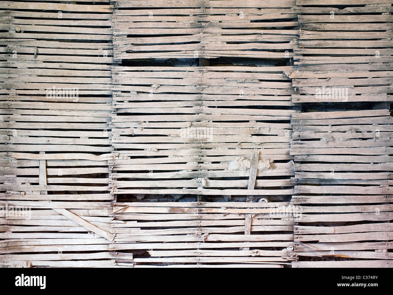 Lath wall with plaster removed Stock Photo