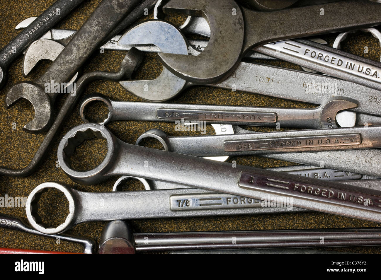 Сar driver using variety repair tools for repairing and diagnostic a car.  Tool set near the orange auto. Mechanic tools in box, closeup Stock Photo -  Alamy