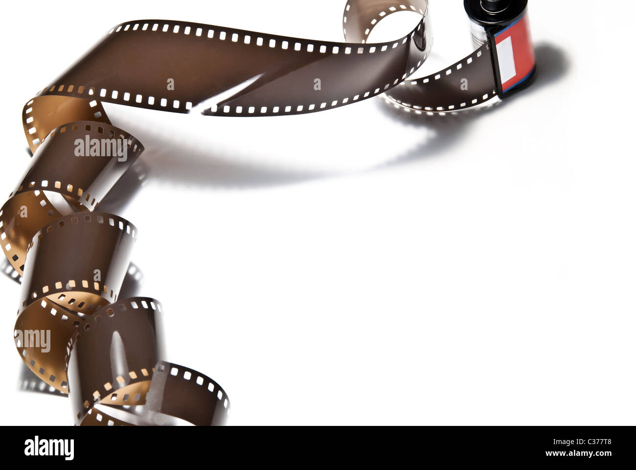 a rolled out analogous photo film on white background Stock Photo - Alamy