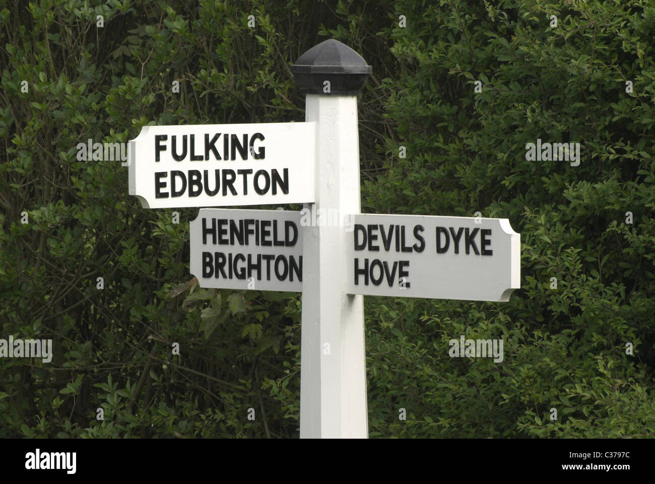 Signpost situated in the village of Poynings, Sussex. Stock Photo