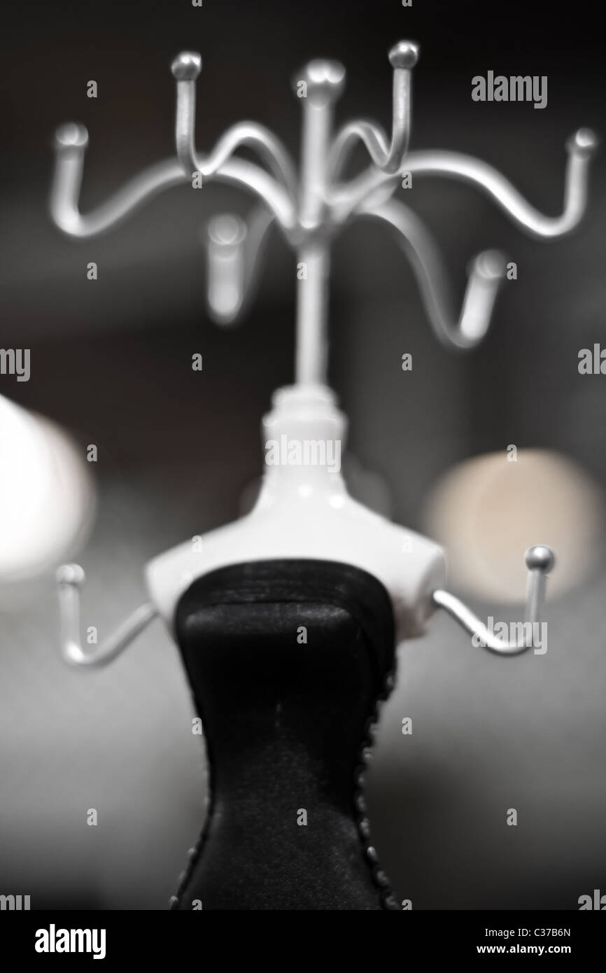 A mannequin in a dress with several hooks for hanging Stock Photo Alamy