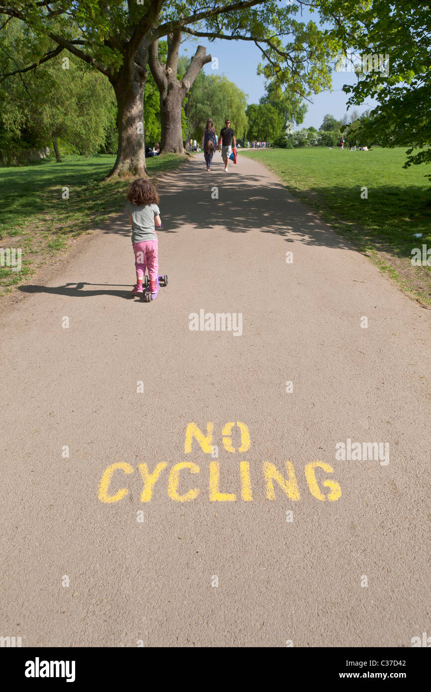 No Cycling Sign on Footpath in Hampstead Heath Park,London,England Stock Photo