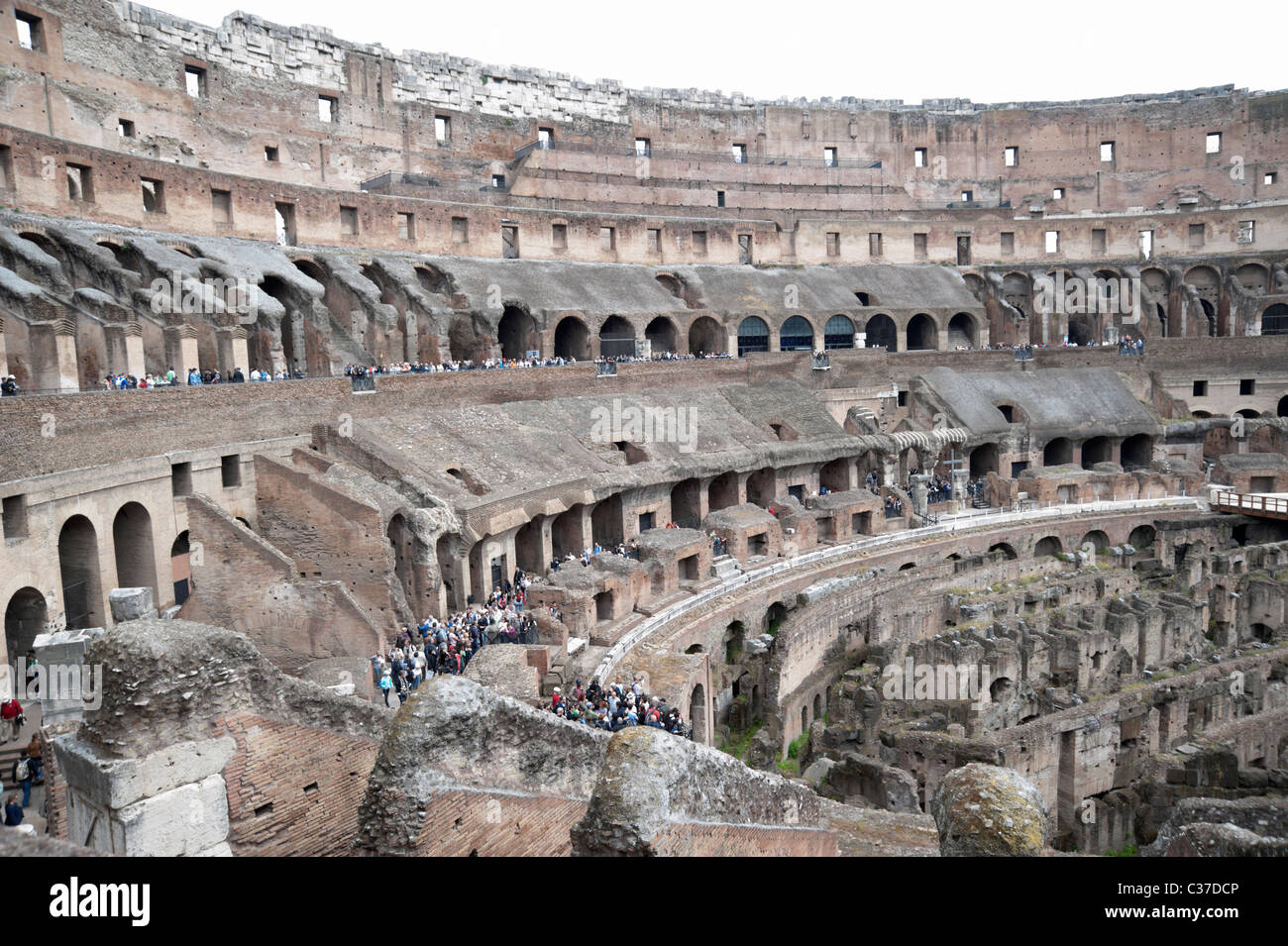 Colosseo (Coliseum) interior view with tourists Stock Photo