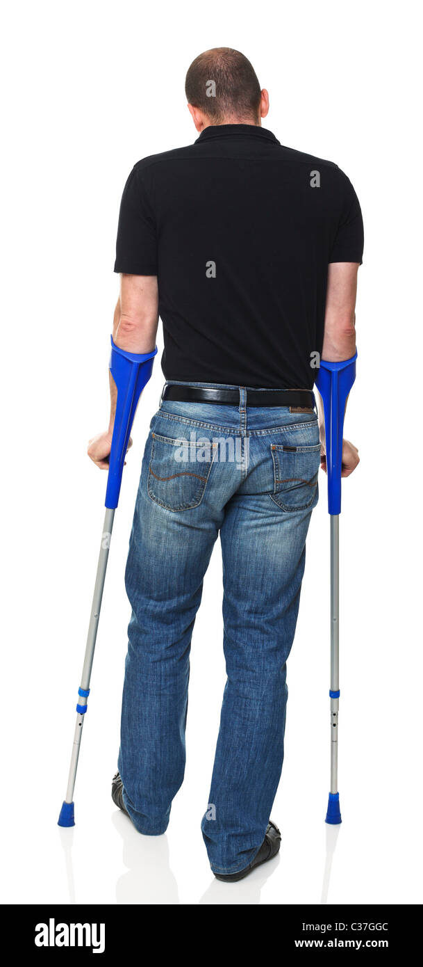 man with crutch isolated on white background Stock Photo Alamy