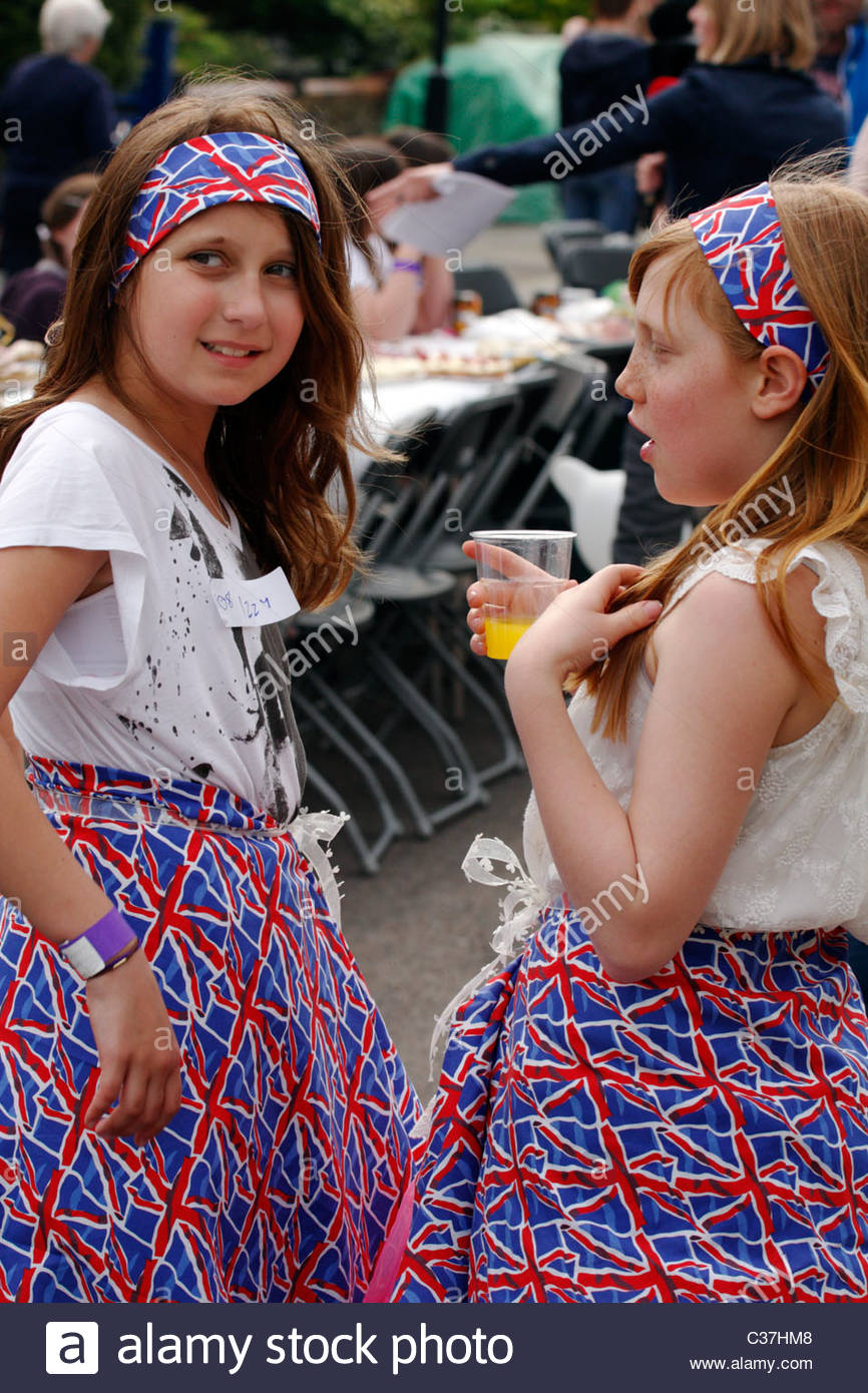 Two Girls In Home Made Union Jack Dresses At Street Party For The