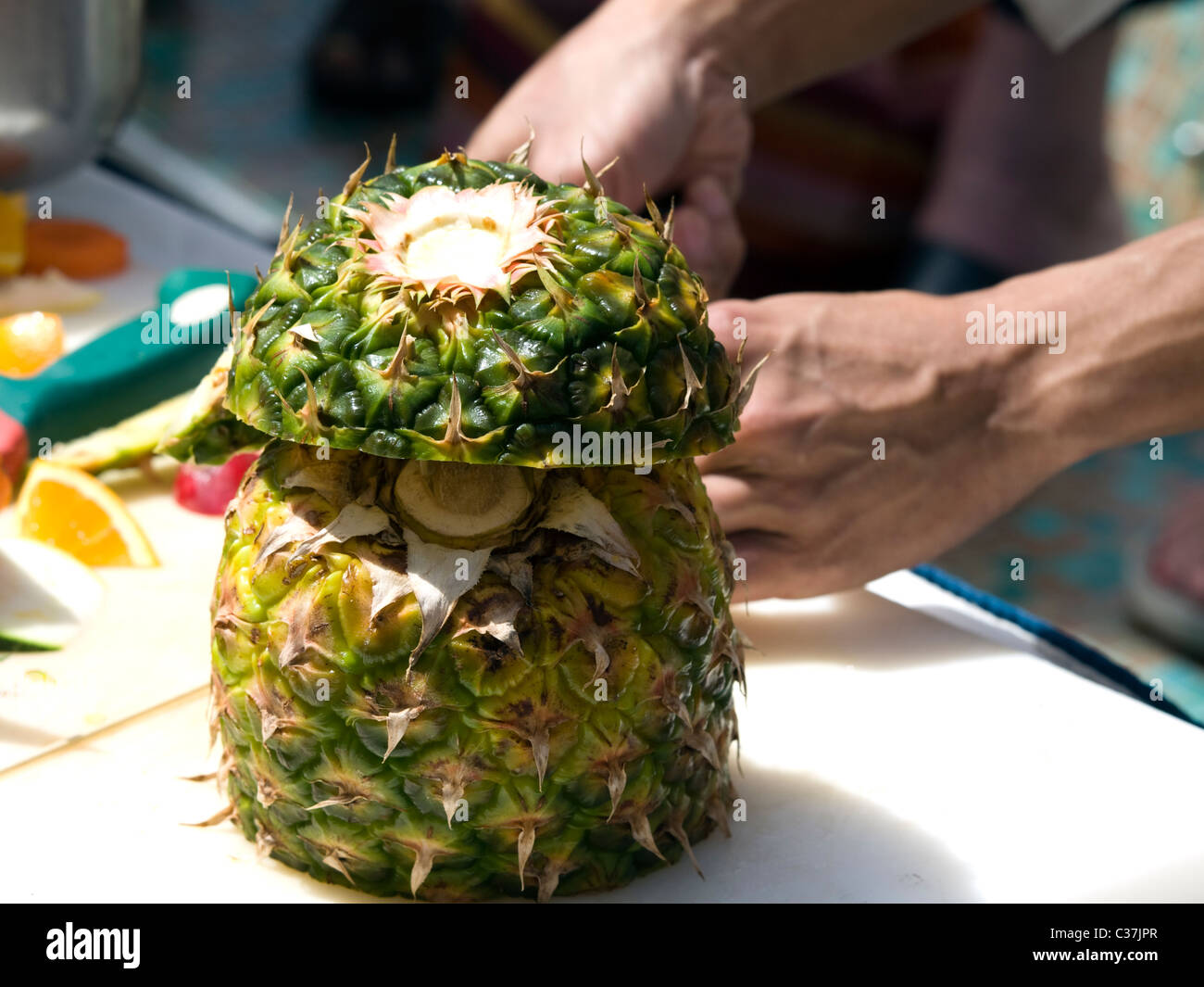 Carving pineapple hi-res stock photography and images - Alamy