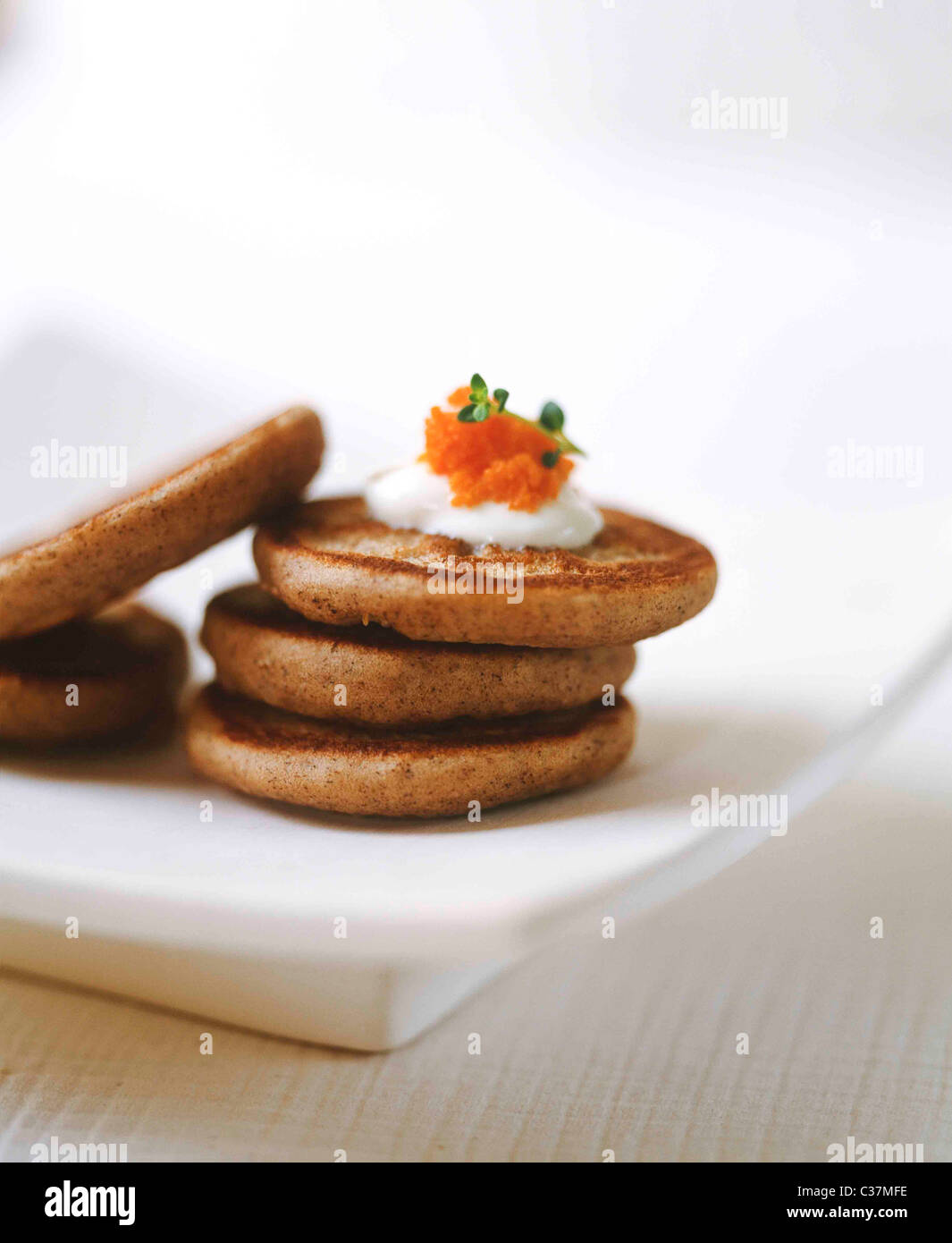 Stack of Blini with caviar Stock Photo