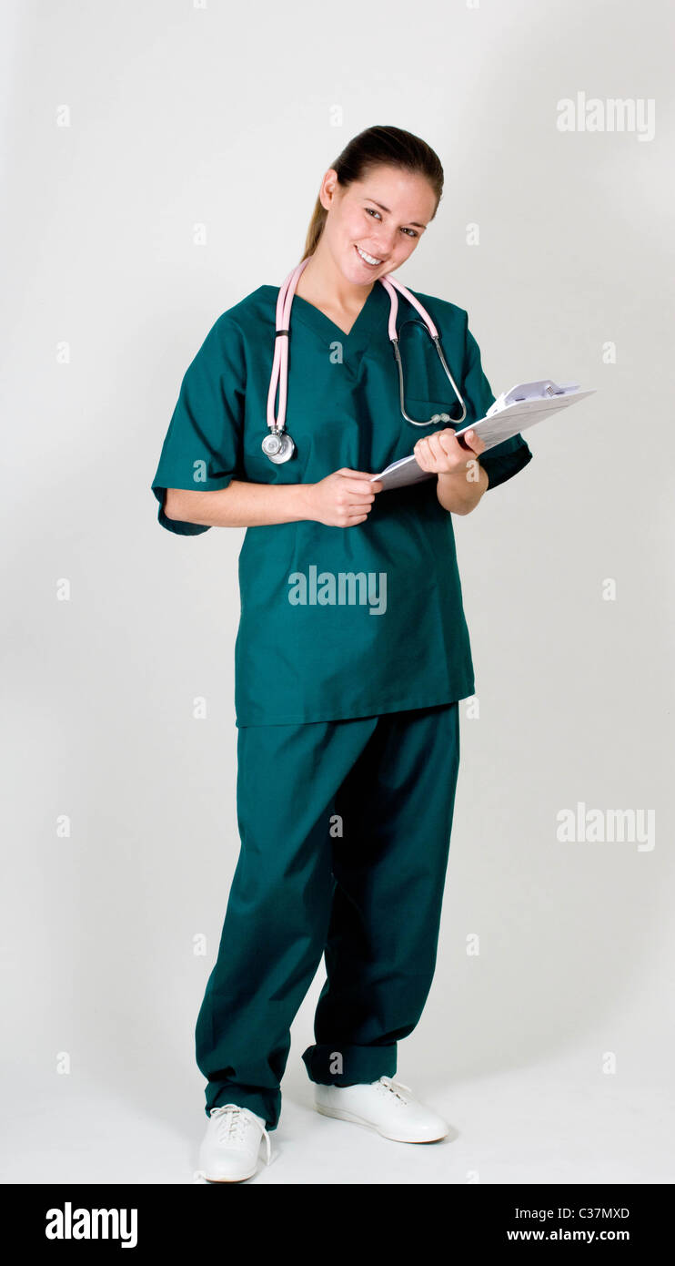 Portrait of young nurse in scrubs, full body Stock Photo Alamy