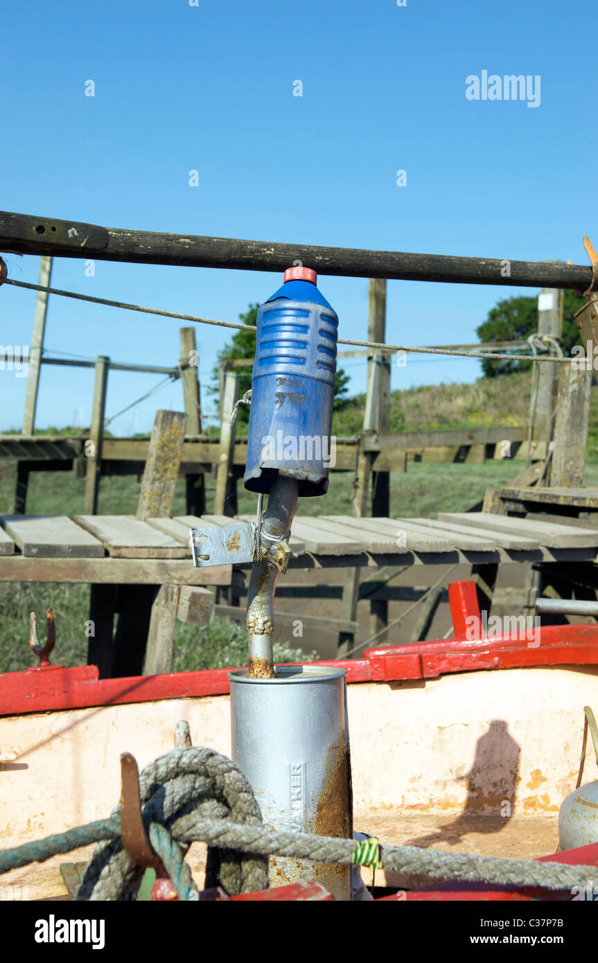 Improvised engine exhaust system on old boat Stock Photo Alamy