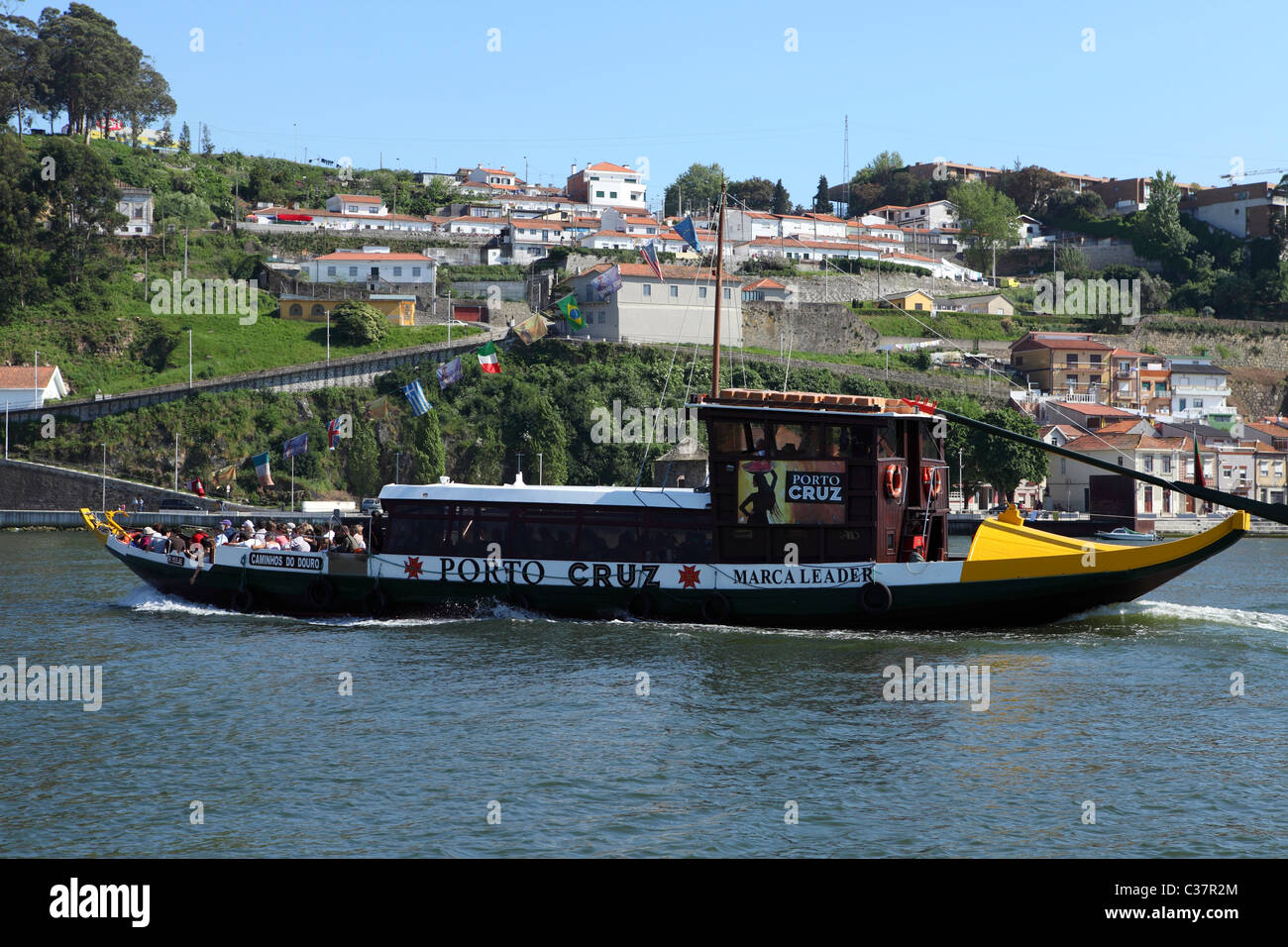 A boat offers a sightseeing cruise on the River Douro at Porto