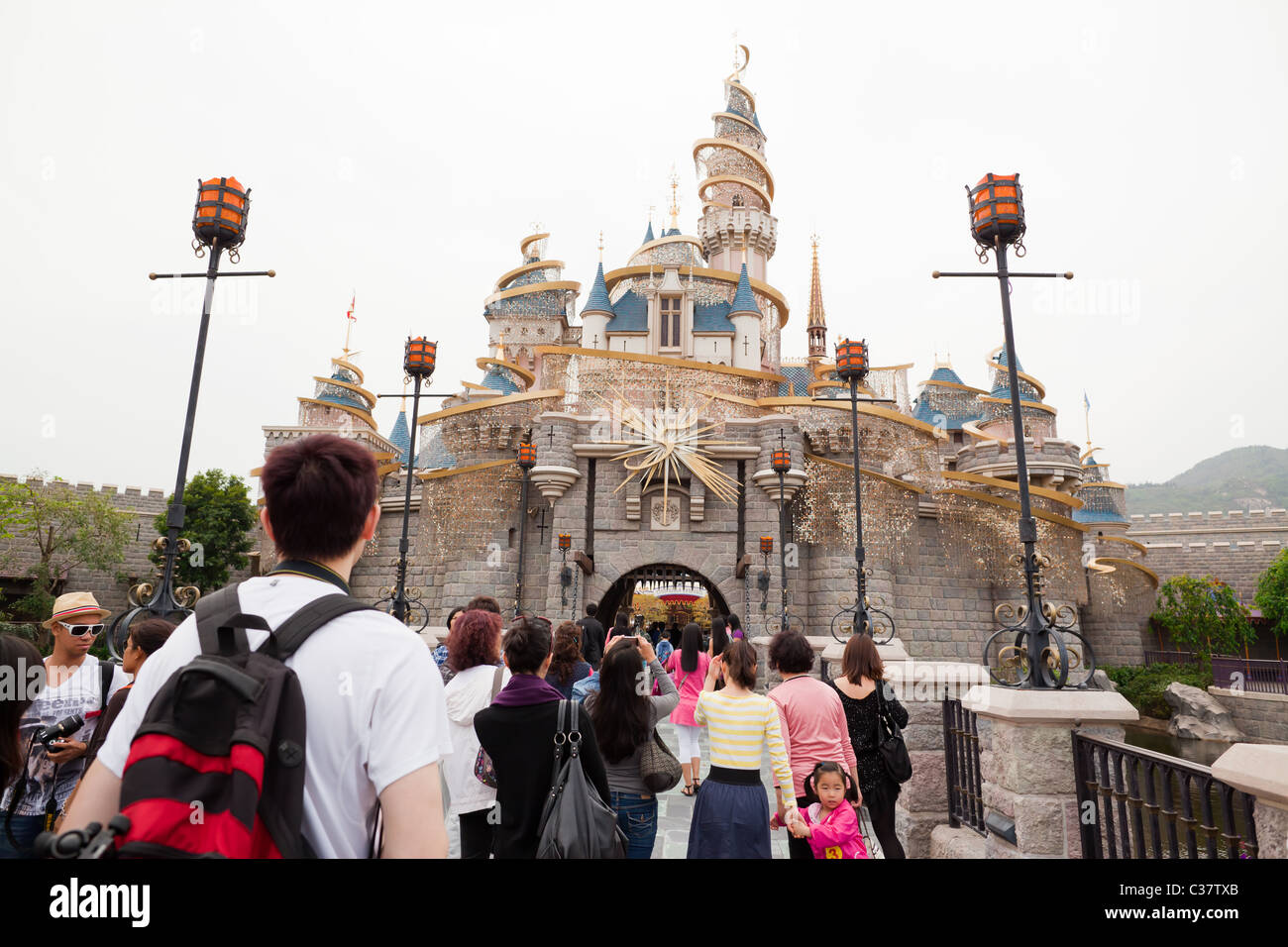 Tourists entering the Princess's Castle of  Hong Kong Disneyland Stock Photo