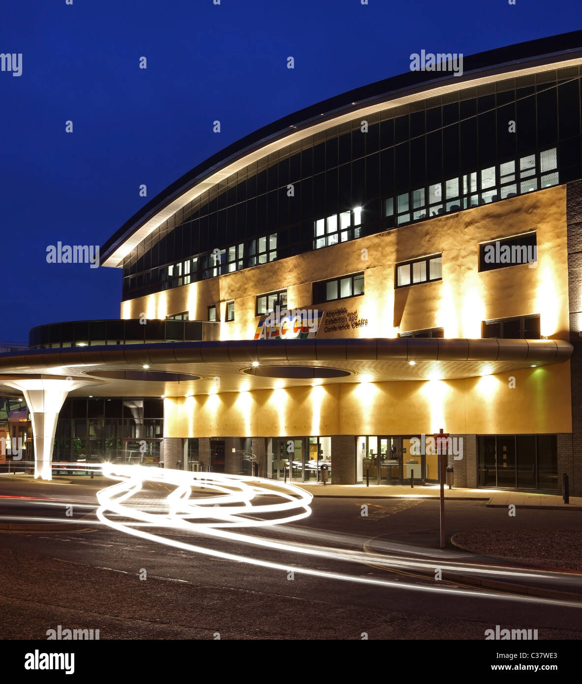 Aberdeen Exhibition and Conference Centre in Aberdeen, Scotland, UK, seen lit up at night Stock Photo