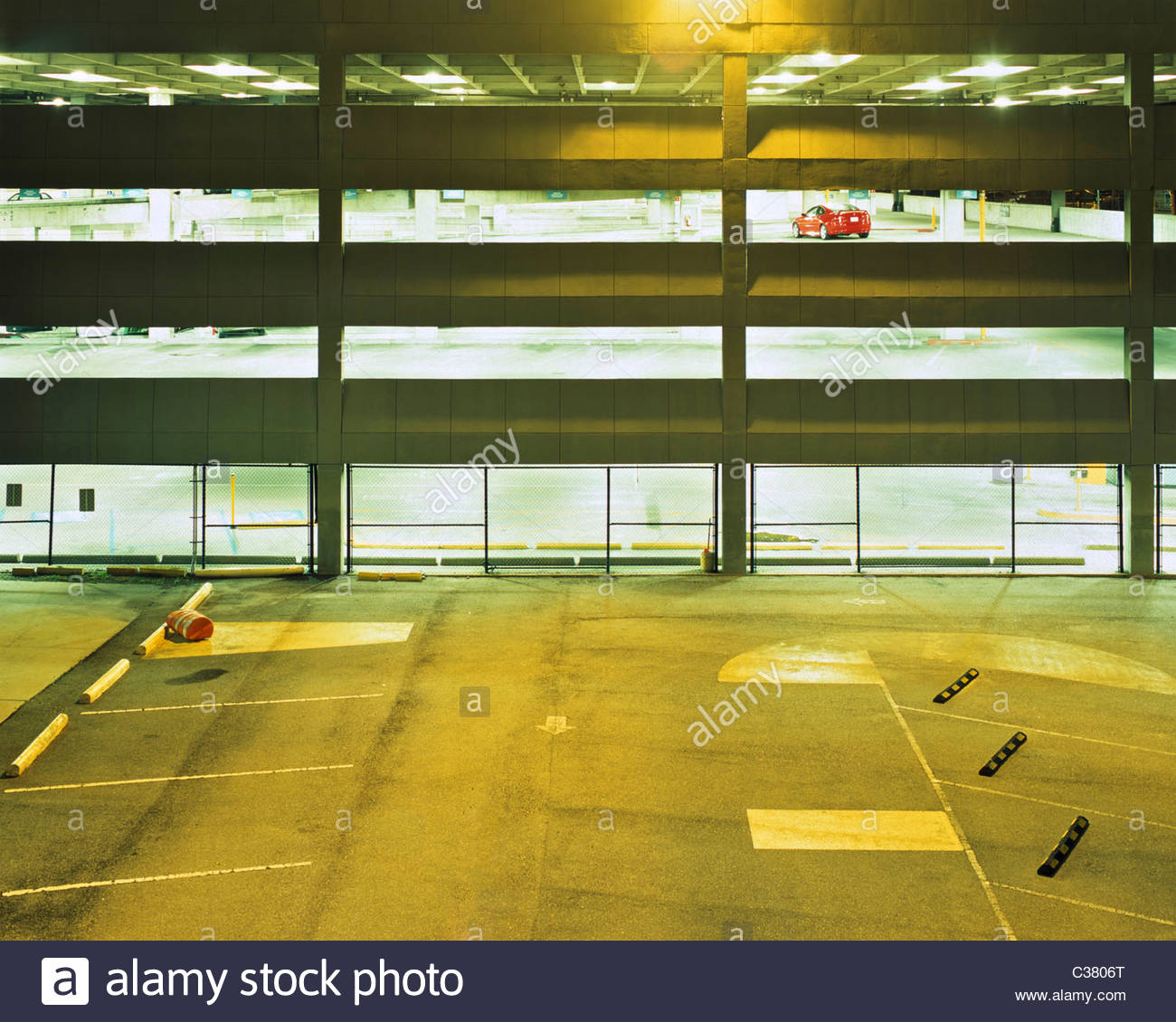 A Single Car Parked In A Parking Garage At Night New Orleans