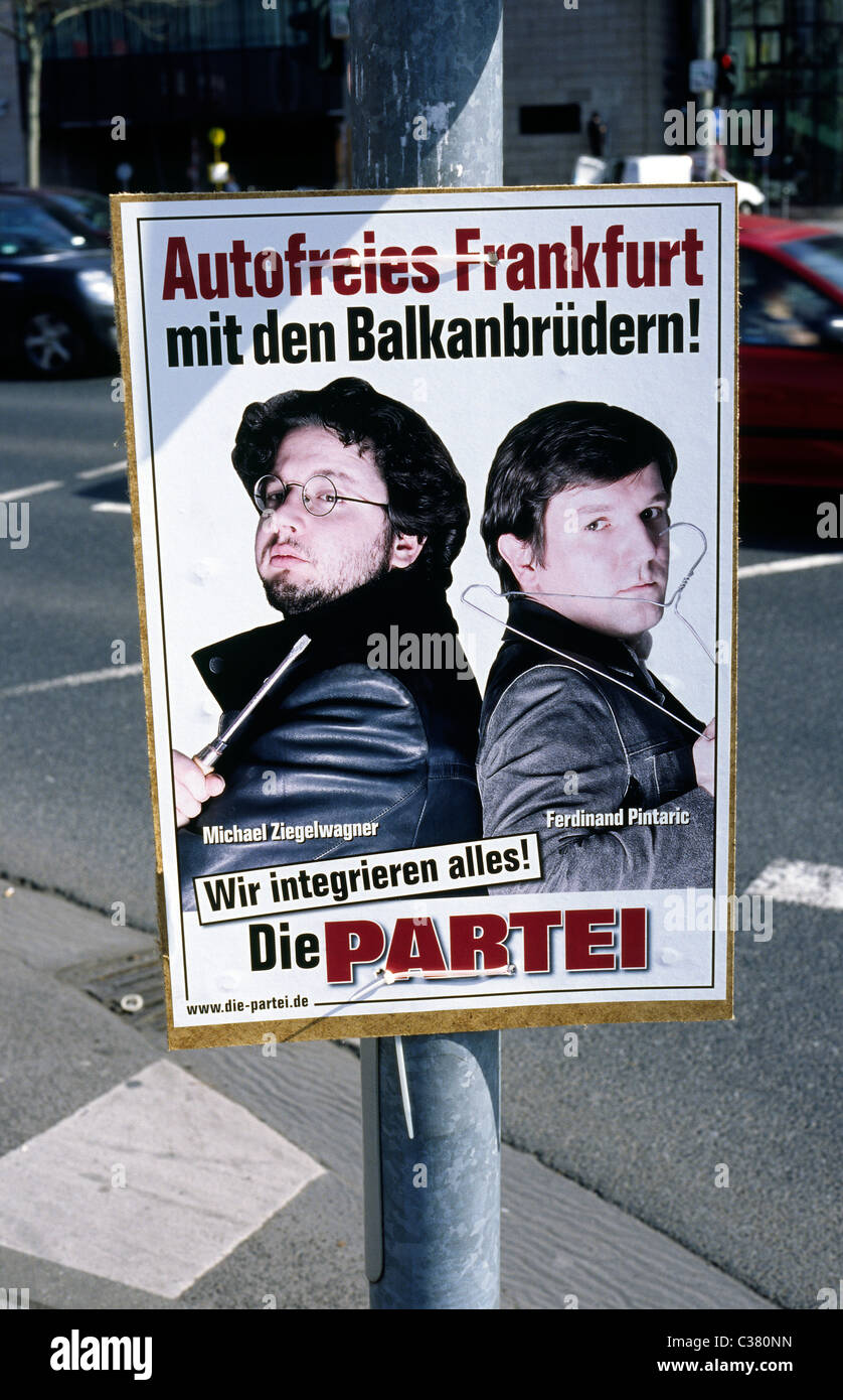 Humorous election campaign poster in Frankfurt am Main pleading for a 'Frankfurt free of cars with the Balkan Brothers'. Stock Photo
