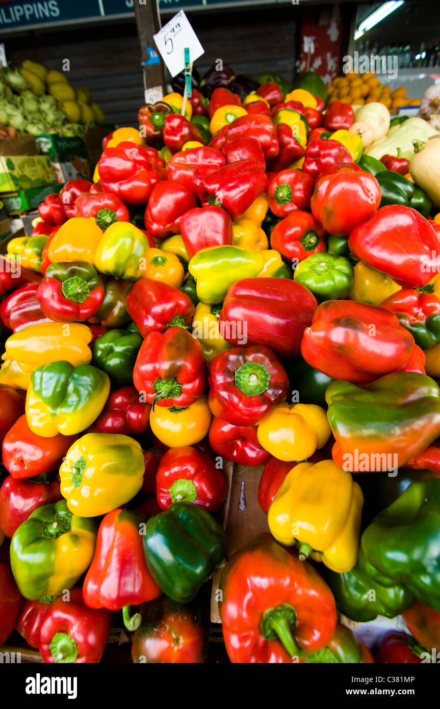 A mosaic of colors. colorful Bell Peppers sold in the Carmel market in ...