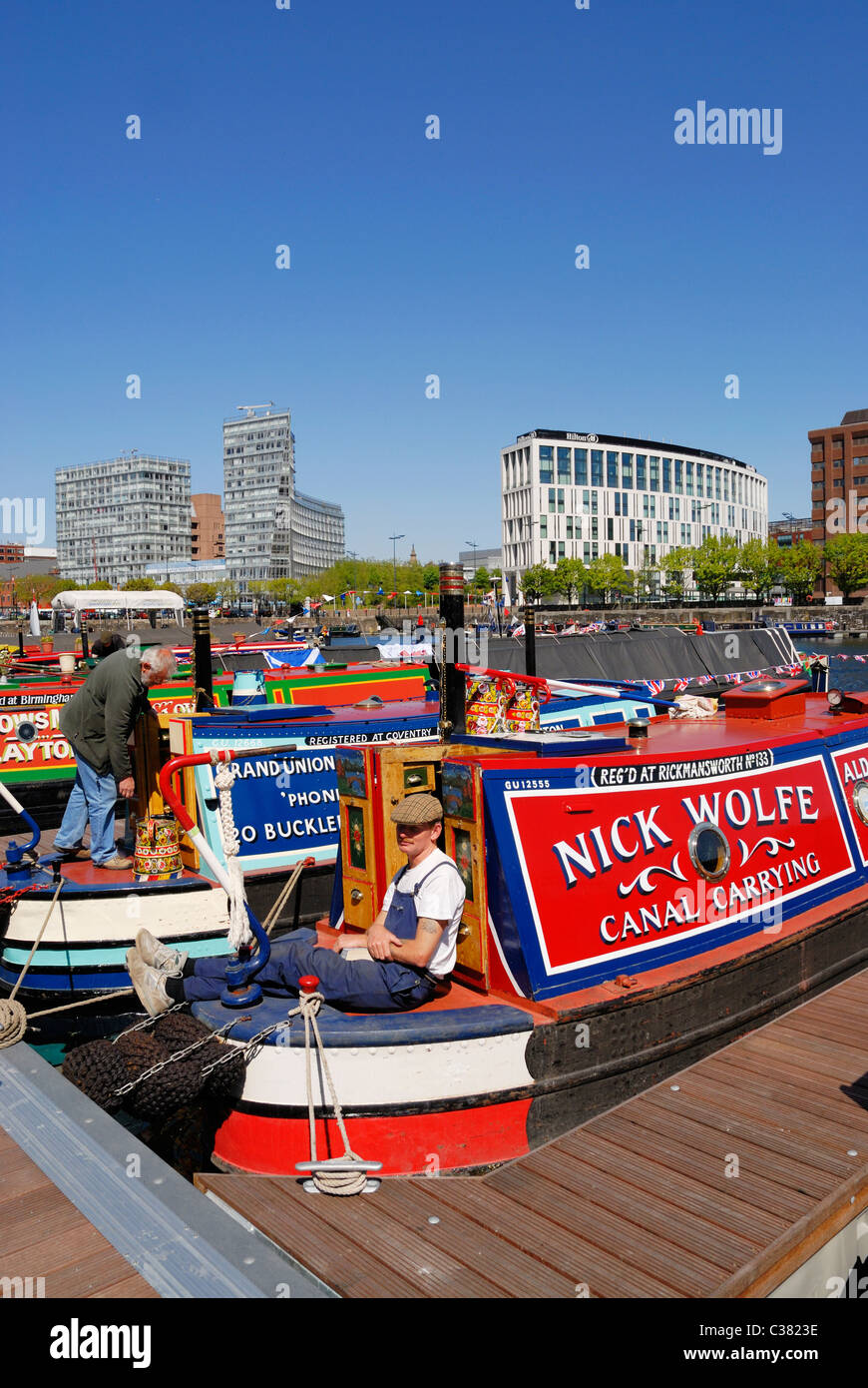 Narrowboats moored in Salthouse Dock ( Albert Dock tourist area ) in Liverpool Docks for the Spring on the Waterfront festival. Stock Photo