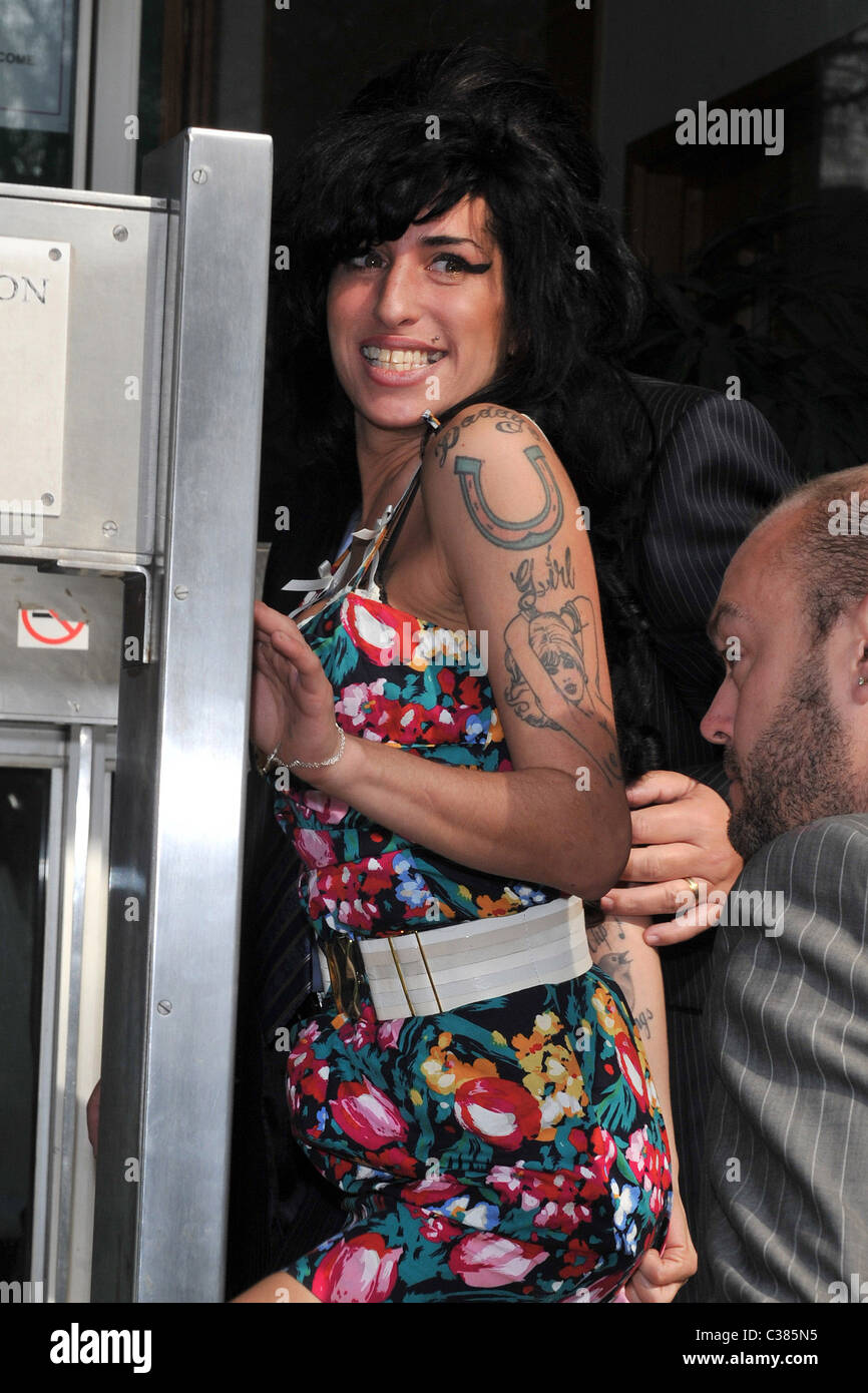 Amy Winehouse arrives for her appearance at City of Westminster