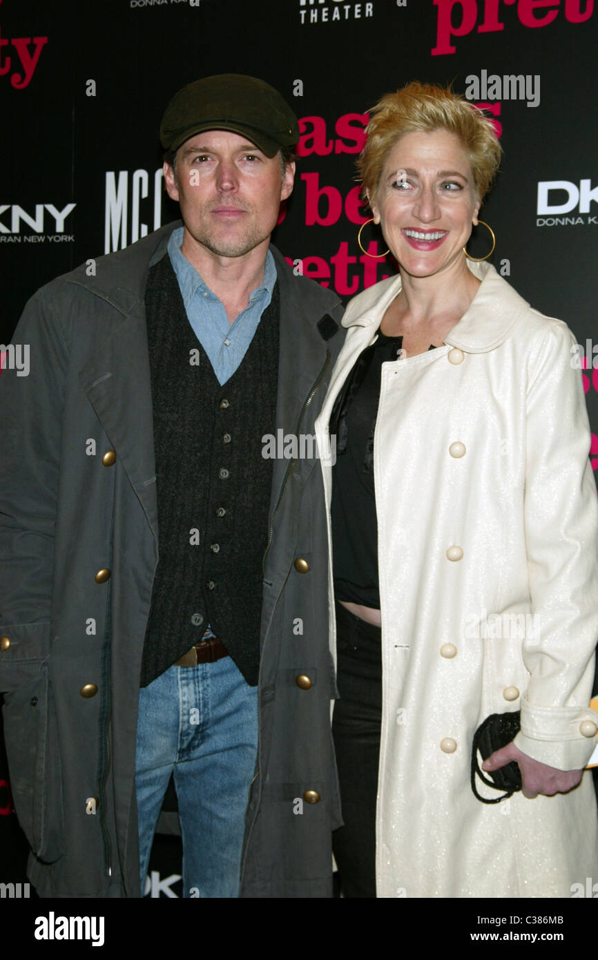 Bill Sage and date Edie Falco  Opening Night of the Broadway play 'Reasons To Be Pretty' at the Lyceum Theatre-Arrivals  New Stock Photo