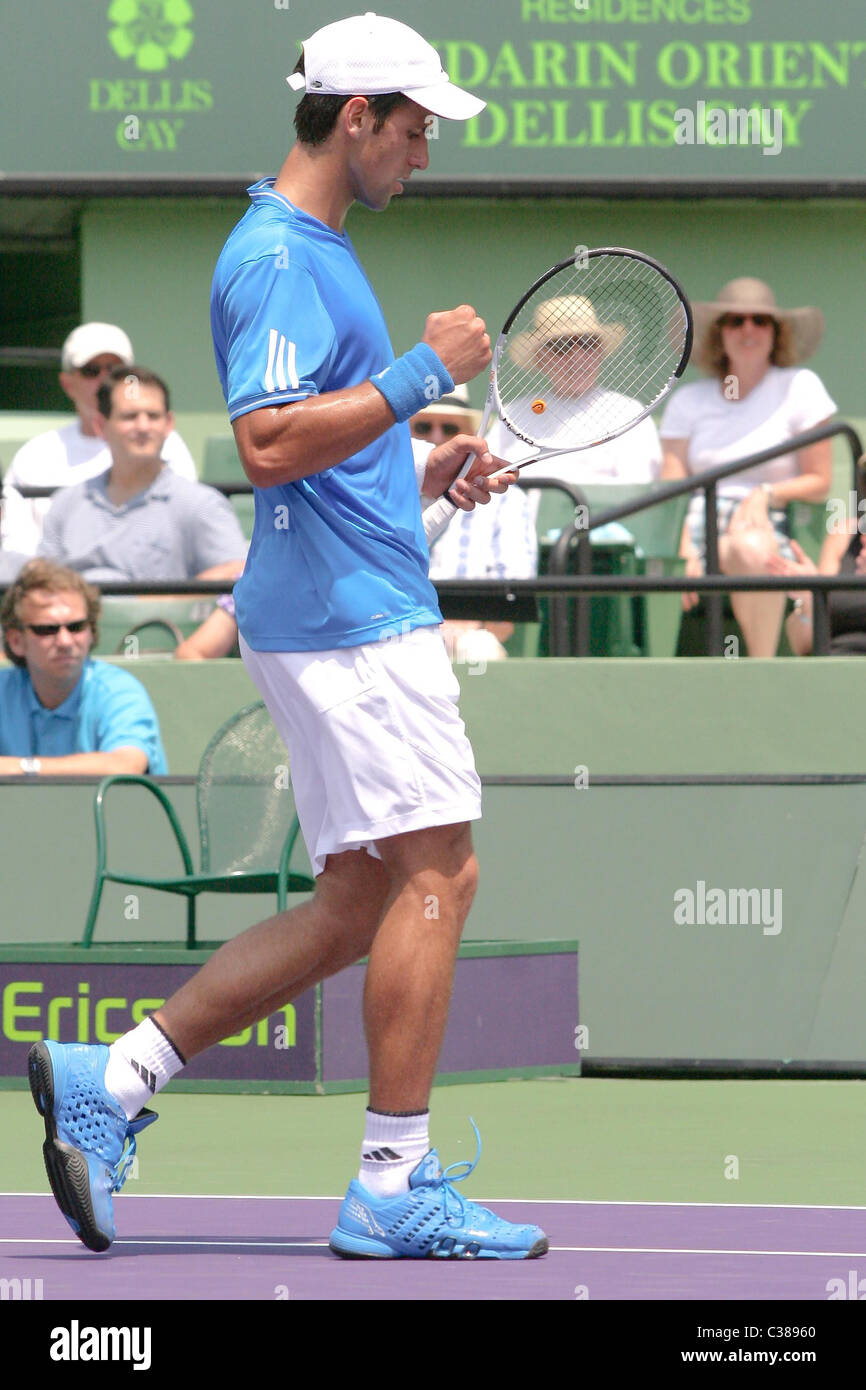 Novak Djokovic plays in a match against Roger Federer at the Sony ...