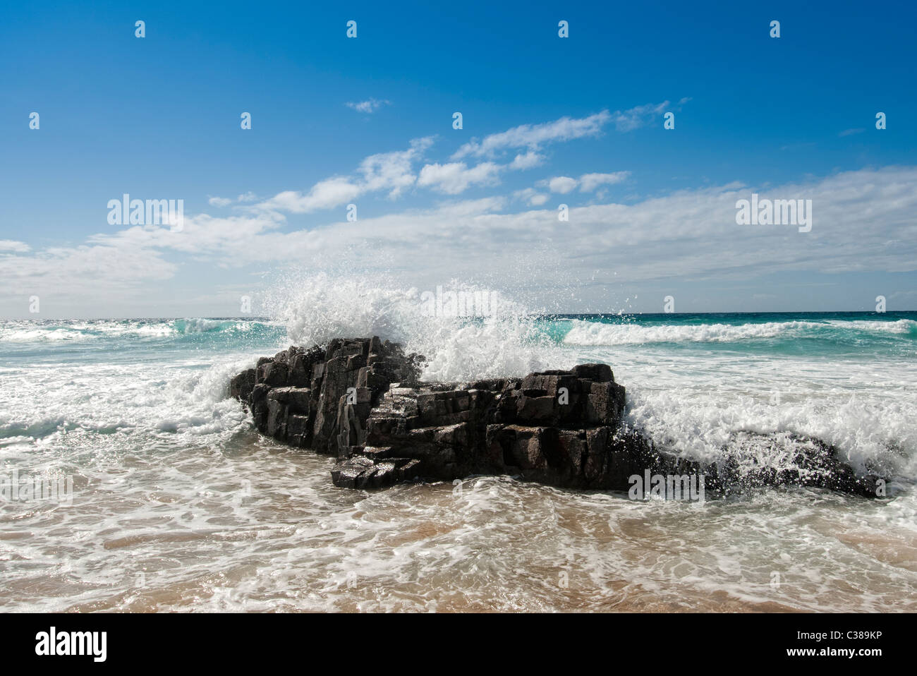 waves splashing over rocks El Cotillo Fuerteventura Canary Islands Stock Photo