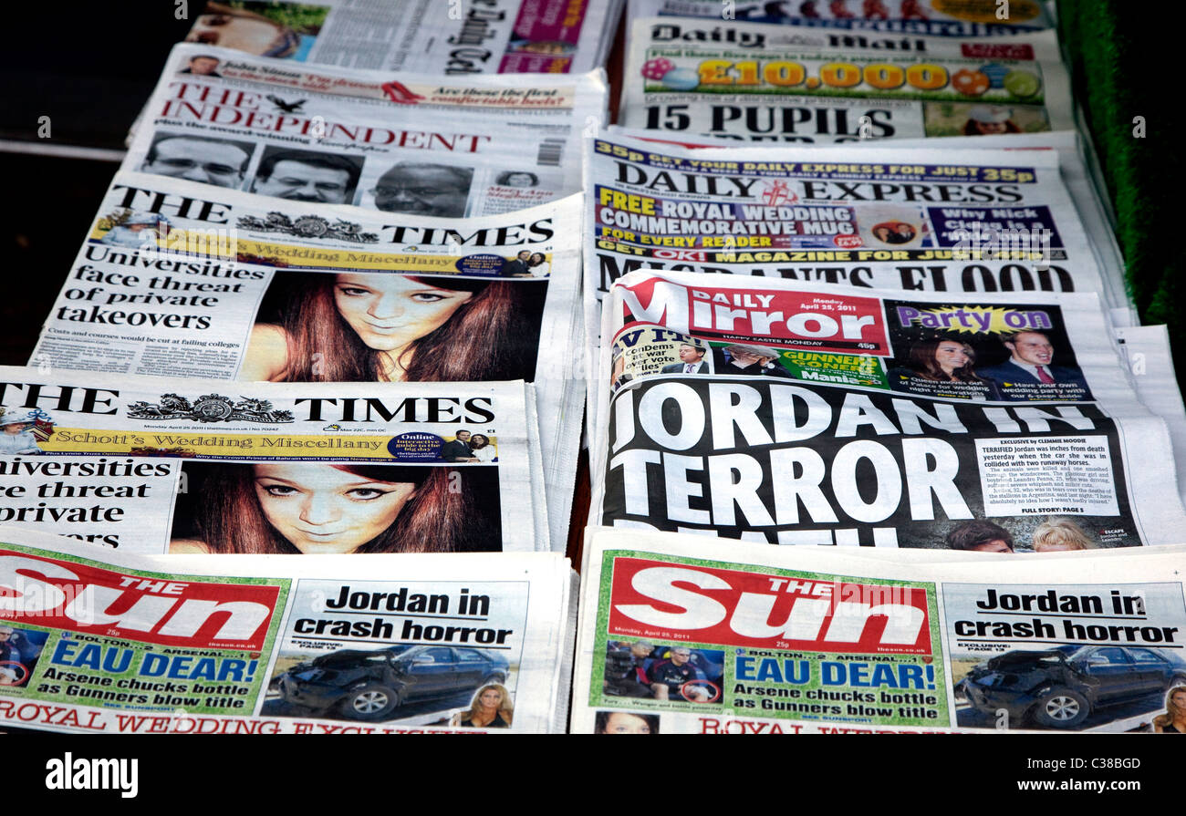 National newspapers on sale outside London shop Stock Photo