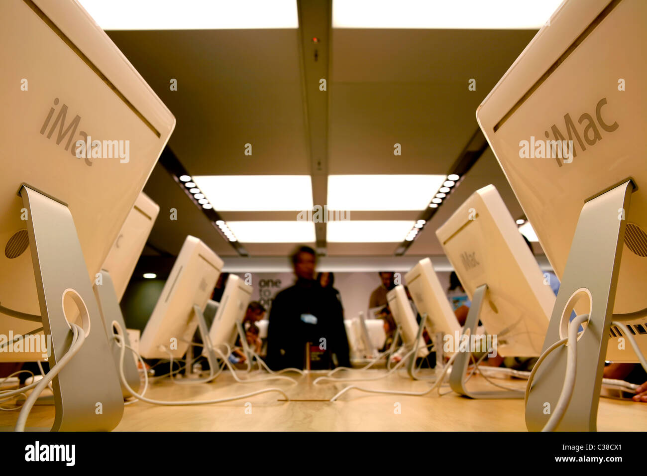 A Customer at an Apple Store Looking at His IPhone while Waiting at an Apple  Store Editorial Photo - Image of imac, computer: 237668441