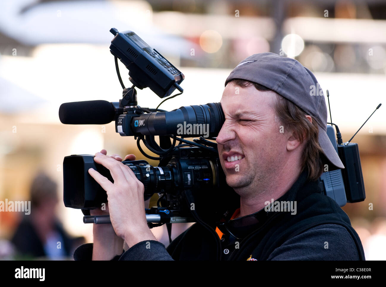 Film cameraman with JVC HD video camera, Perth, Western Australia Stock Photo