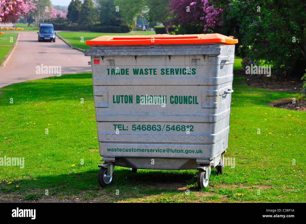 Wheelie bin for trade waste in Luton Stock Photo - Alamy