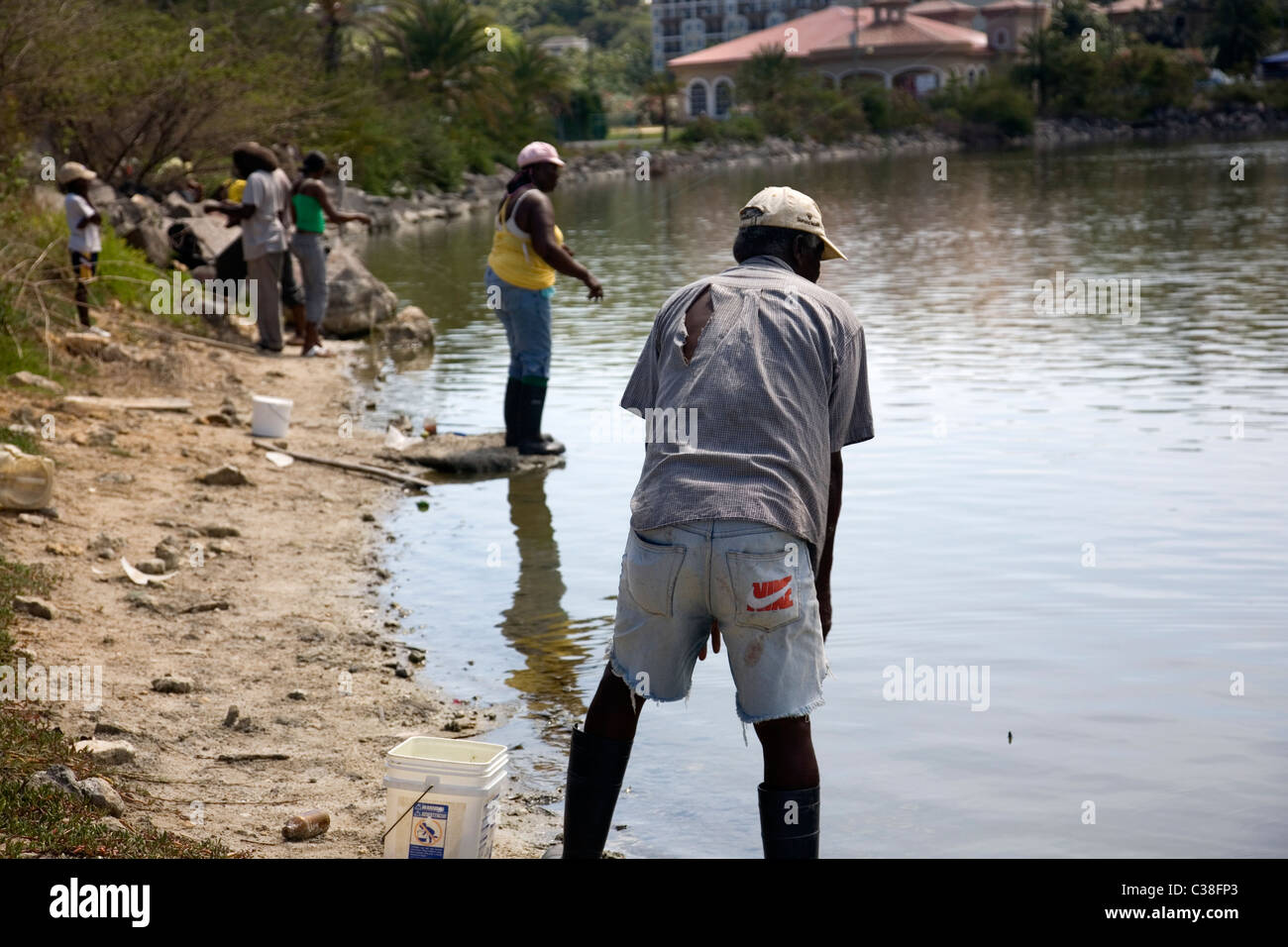Fishing at McKinnons Pond in Antigua Stock Photo Alamy