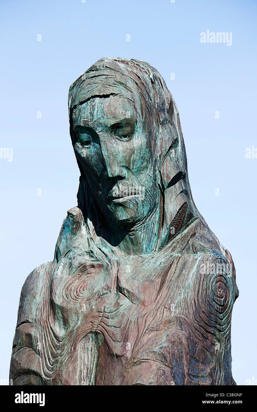 Sculpture of St.Cuthbert.by Fenwick Lawson.Holy island of Lindisfarne Stock Photo