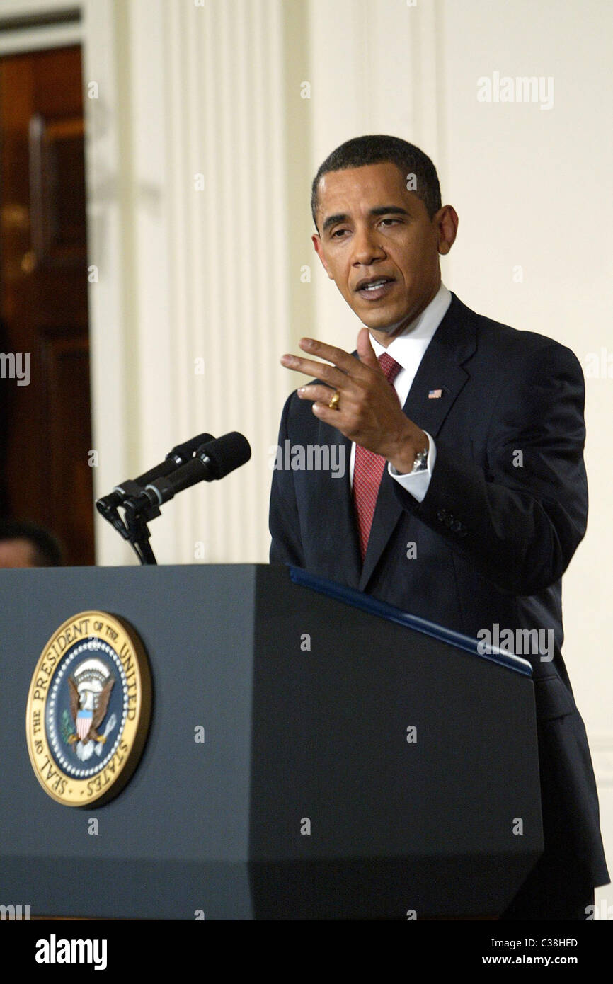 U.S. President Barack Obama answers questions in the East Room of the ...