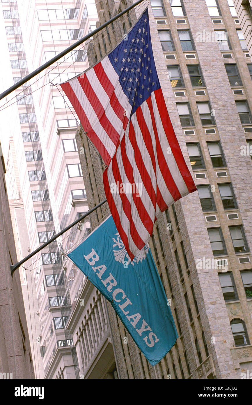 Barclays logo on a flag flying alongside the American flag. Stock Photo