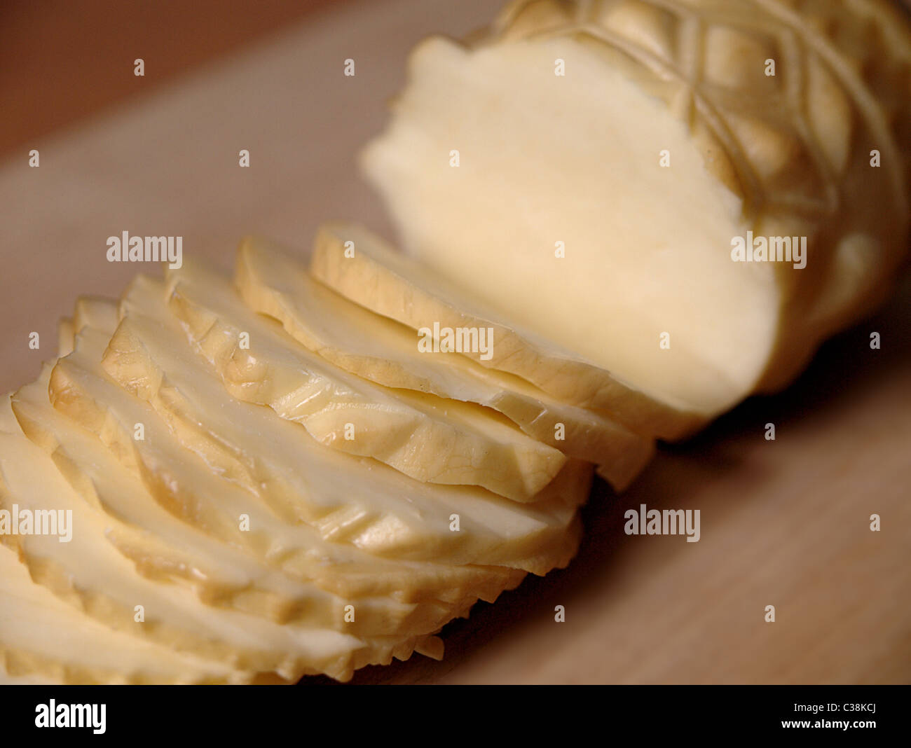 sliced, smoked, yellow cheese – local cuisine Stock Photo