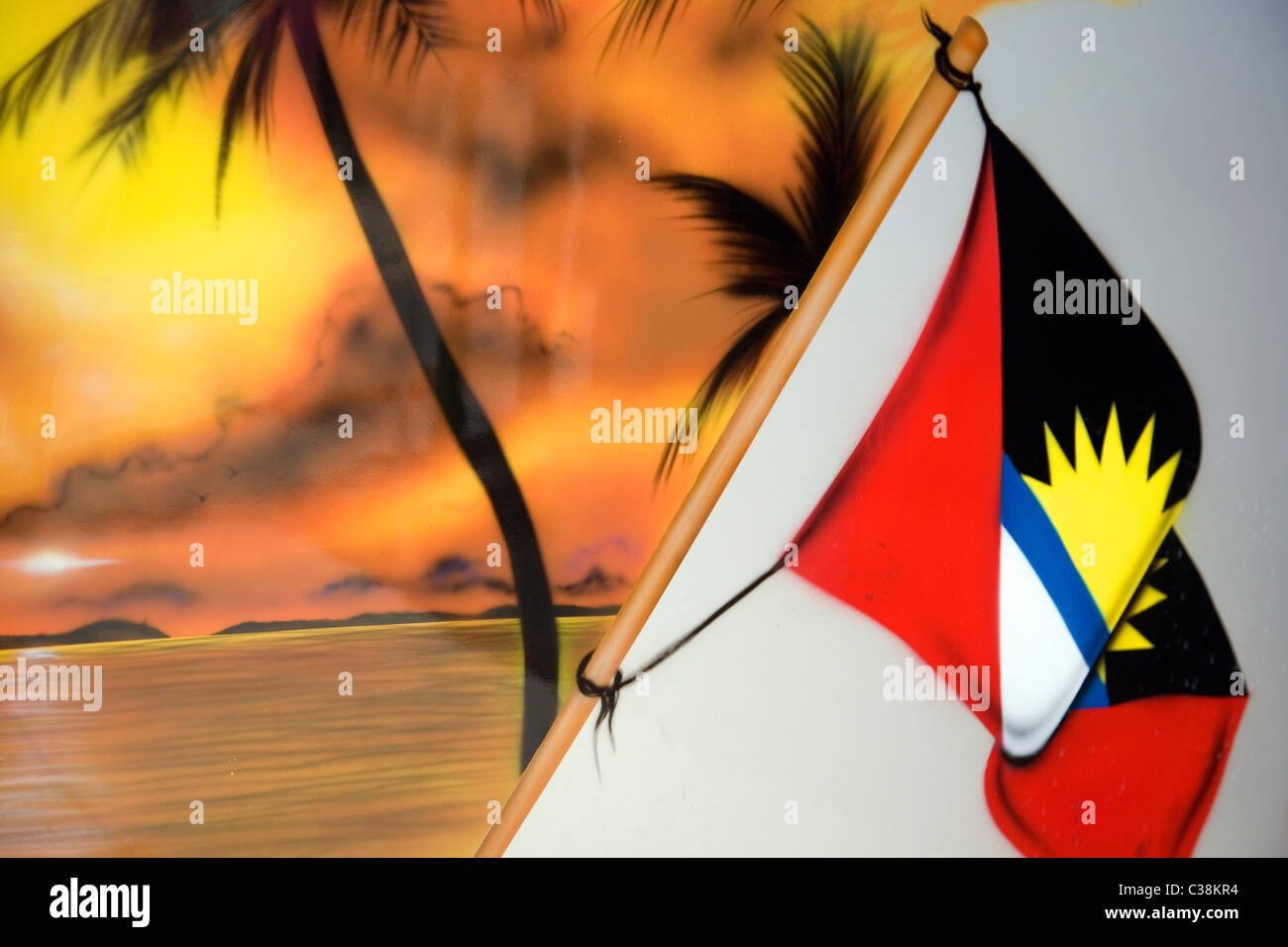 Spray Painted depiction of Antiguan Palms and Flag on back of bus Stock Photo