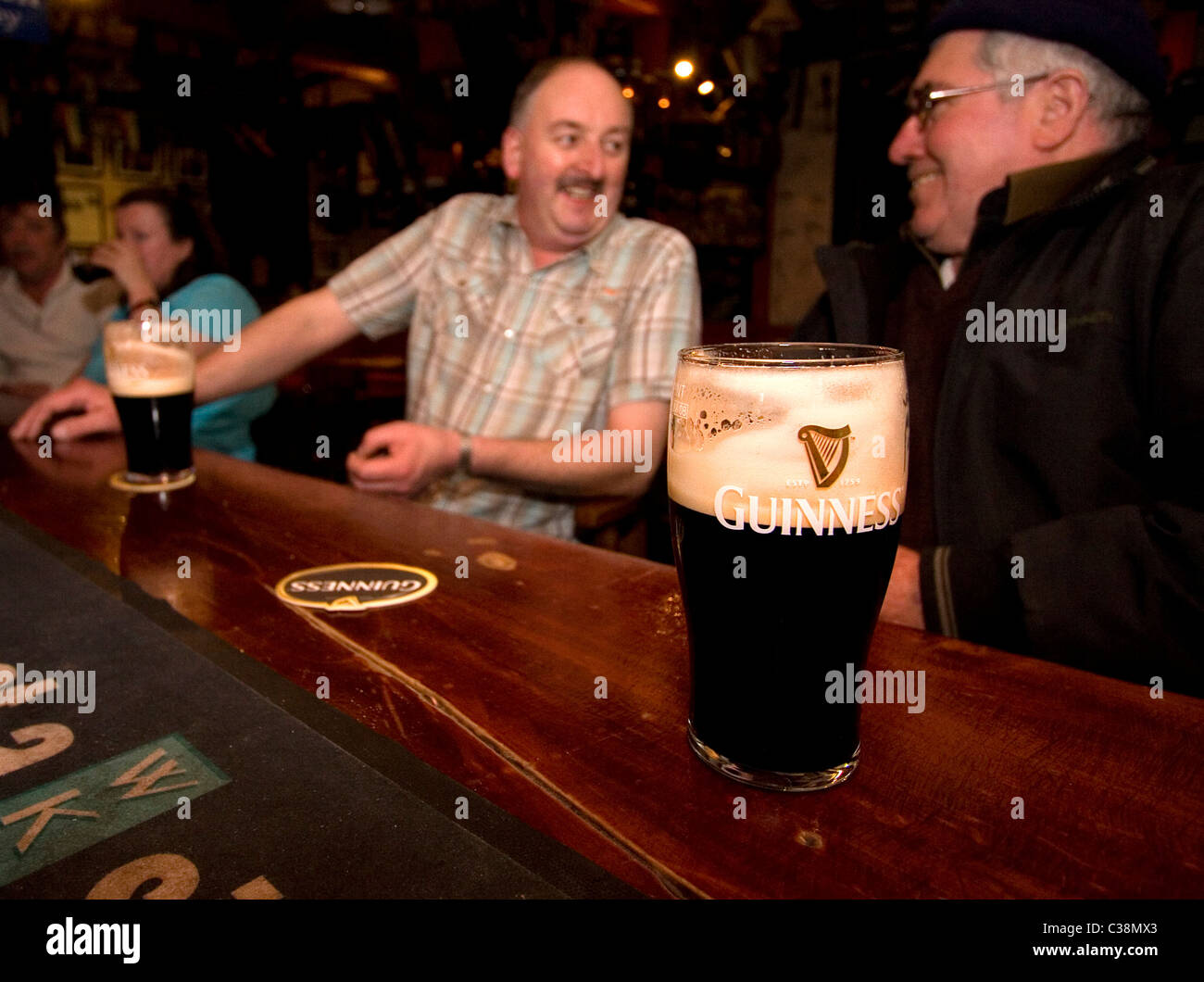 customers-enjoy-guinness-in-hells-kitchen-pub-castlerea-county