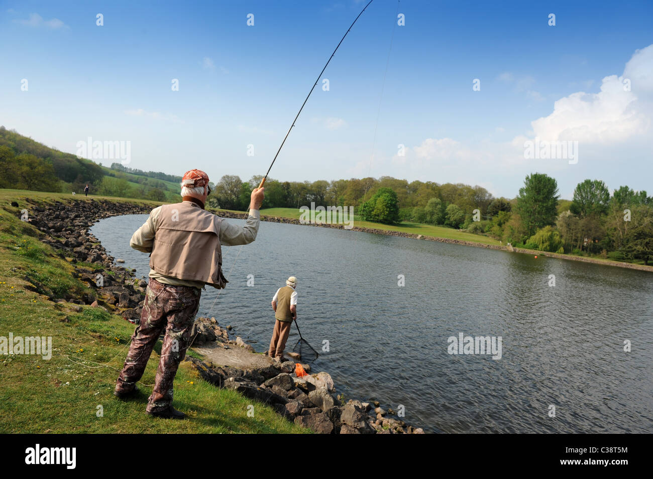 Men fly fishing at Trimpley Reservoir near Arley Worcestershire England Uk Stock Photo