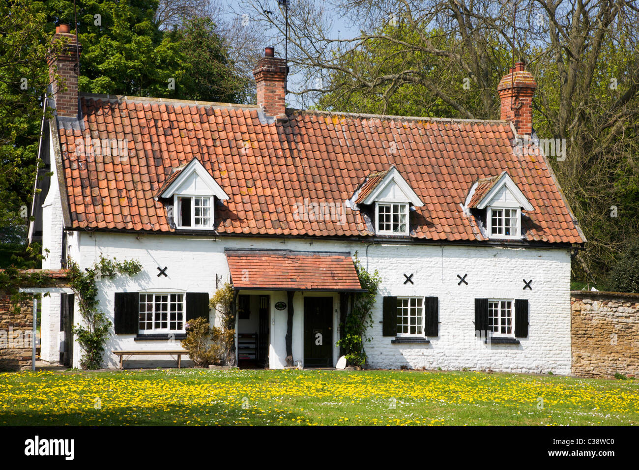 Pretty Cottage on the Village Green Burton East Riding of Yorkshire England Stock Photo