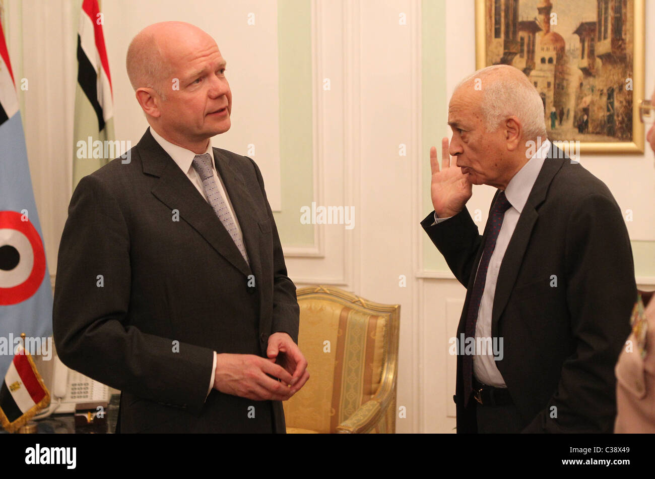 Egyptian Foreign Minister Nabil El Araby meets British Foreign Secretary William Hague before their meeting with Hussein Tantawi Stock Photo
