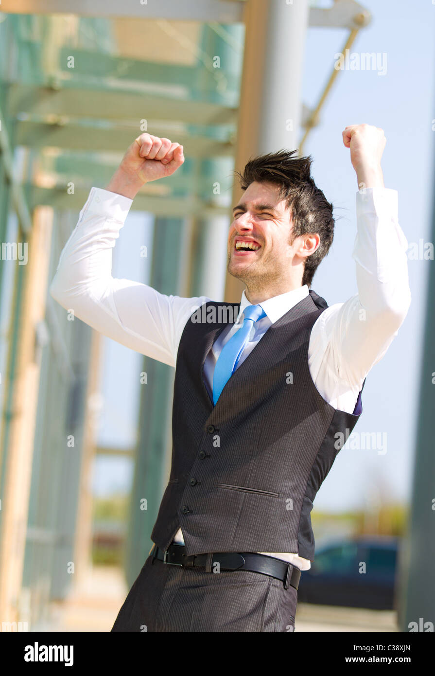 Man with arms in the air Stock Photo