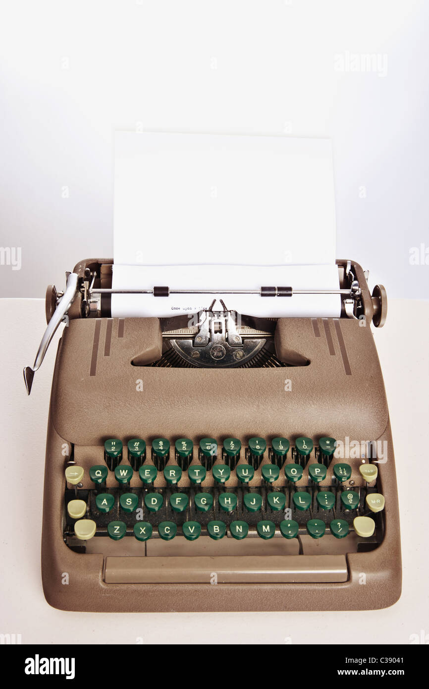 an old typewriter with the beginnings of a novel typed onto the paper Stock Photo