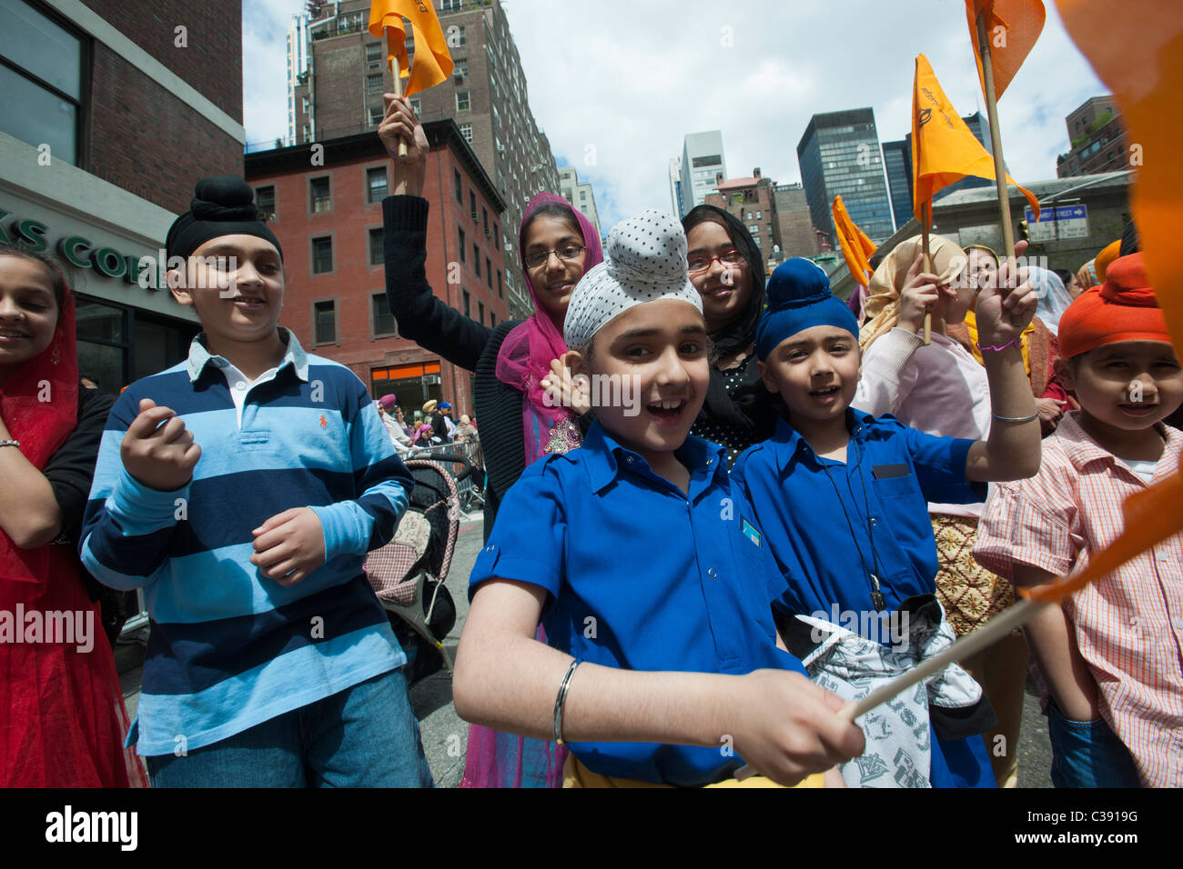 Thousands watch and participate in the 24th Annual Sikh Day Parade in