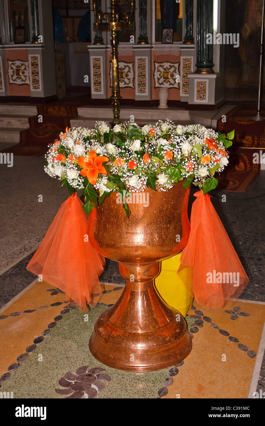 GreekOrthodox flower decorated baptismal font Stock Photo Alamy