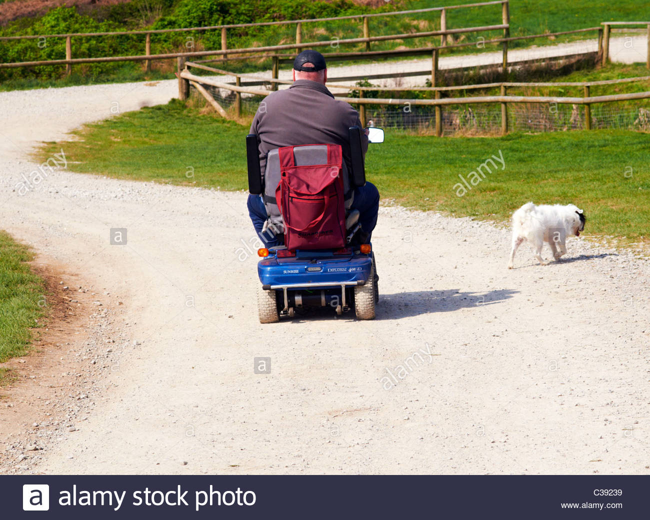 Fat Man Mobility Scooter High Resolution Stock Photography and Images