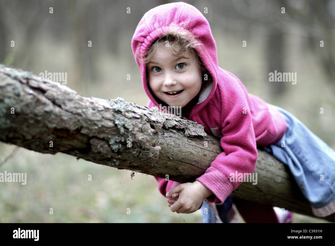 Young girl posing in the forest Stock Photo - Alamy