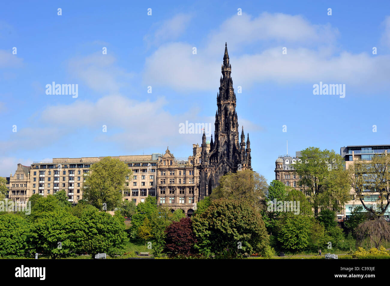 Royal Scott Monument Princes Street Edinburgh from Princes Street Gardens with Jenners Department store in background Stock Photo