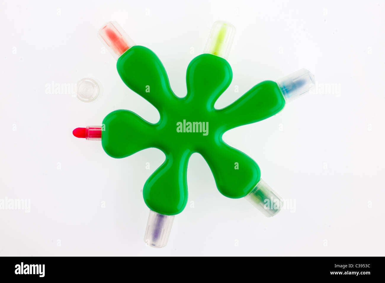 Unusual shaped green kiddies multicolored felt tip pens Stock Photo