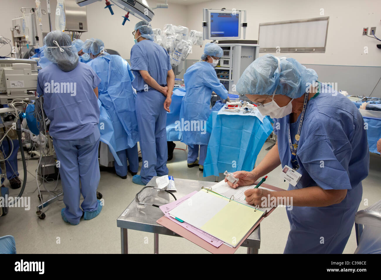 Surgery in Hospital Operating Room Stock Photo