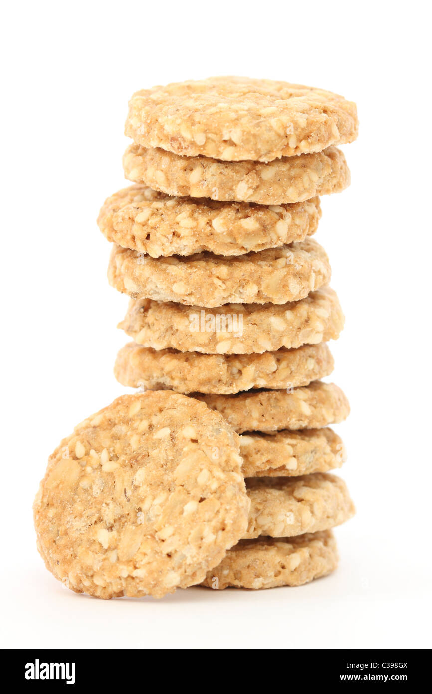 Stack of whole grain biscuits on white background Stock Photo